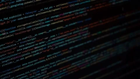 Computer code on a black monitor scrolling down showing numbers and Stock Footage 168274857