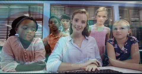 Computer code image over diverse children and teacher in classroom Foto stock
