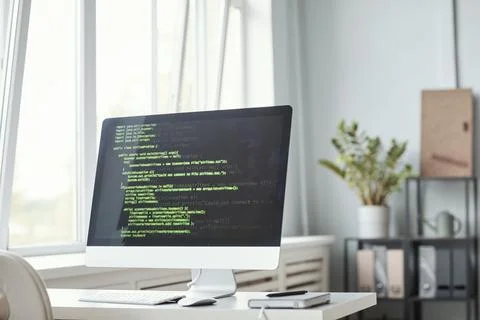 Computer with Code in Office 写真素材