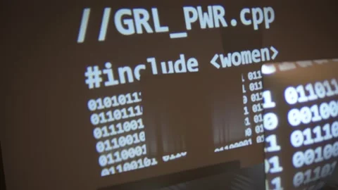 Computer with code projected on top with text woman included Stock Footage