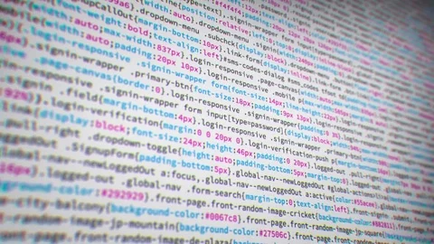 Computer Coding Javascript and HTML for the Web in Closeup Loop Stock Footage 77604046