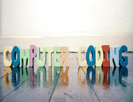 Computer coding text with wooden letters 写真素材