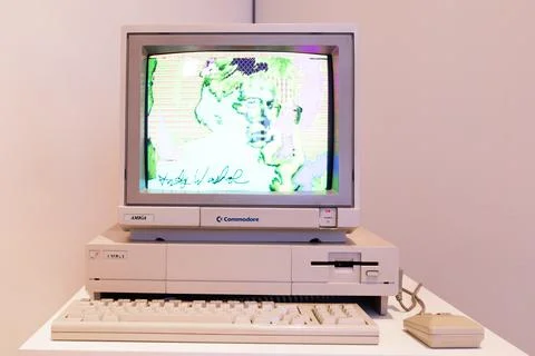 Computer Commodore Amiga 1000 with floppy disk and mouse Foto stock