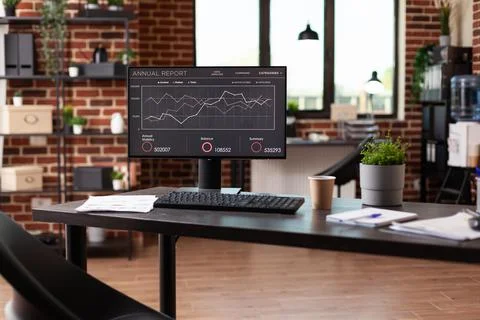 Computer with company data analysis in business office Stock Photos