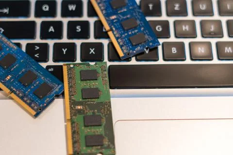 Computer components on the keyboard Stock Photos