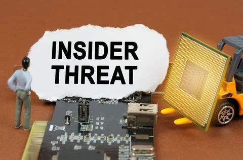Computer concept. On the board with microcircuits lies a paper plate with the Stock Photos