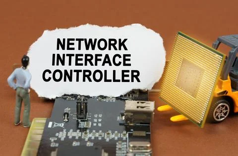 Computer concept. On the board with microcircuits lies a paper plate with the Stock Photos