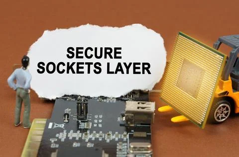 Computer concept. On the board with microcircuits lies a paper plate with the Stock Photos