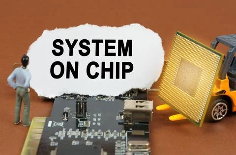 Computer concept. On the board with microcircuits lies a paper plate with the Stock Photos