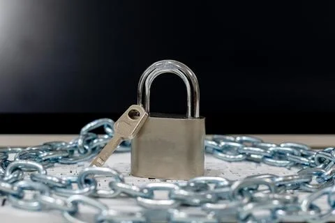 Computer concept Network Security Lock system entry key and chain. Stock Photos
