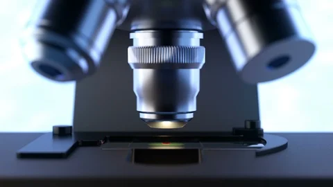 Computer controlled microscope inspecting a drop of blood Vídeos de archivo 114741658