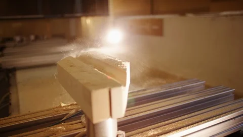 Computer controlled milling machine precisely shaping a piece of wood Stockbeeldmateriaal 119033529