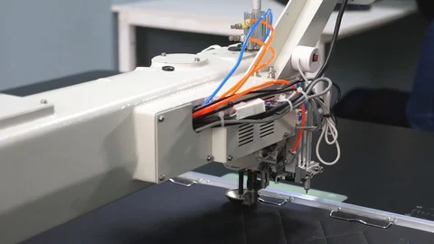 Computer controls sewing machine. automatic sewing machine. Robot sewing machine Stock Footage 111231931