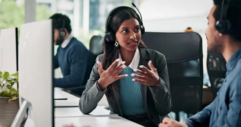 Computer, conversation and support with business people in call center for Stock Footage 321797115