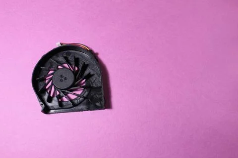 Computer cooler laptop on pink or blue background reont there is a copy of th Stock Photos