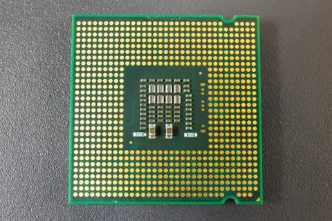 Computer CPU Chip on black surface background Stock Photos