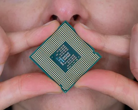 Computer cpu chip over the mouth, front view 스톡 사진
