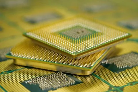 Computer CPU with exposed connectors showing the complexity of electronic d.. Photos