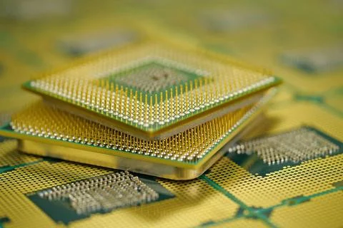 Computer CPU showing intricate network of pins for electrical connections Stock Photos