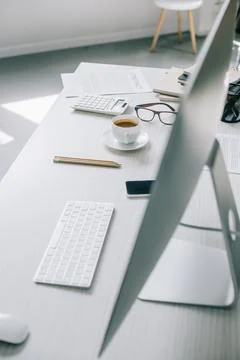 Computer cup coffee smartphone table Stock Photos
