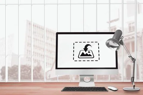 Computer on a desk against front of building with bright light Stock Illustration