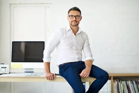 Computer, desk and portrait of web development man in office for administration 写真素材
