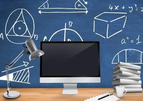 Computer Desk foreground with blackboard graphics of mathematical diagrams Stock Photos