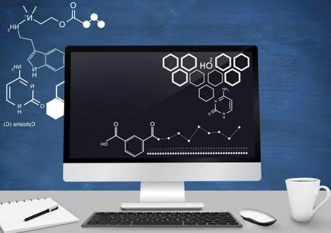 Computer Desk foreground with blackboard graphics of science diagrams Foto stock