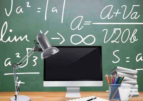 Computer Desk foreground with blackboard graphics of formulas Stock Photos