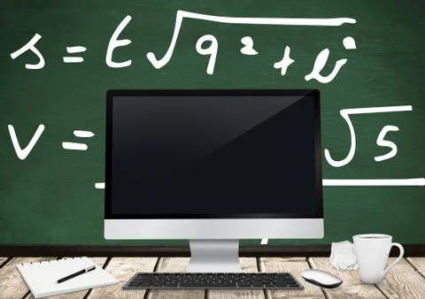 Computer Desk foreground with blackboard graphics of formulas Stock Photos