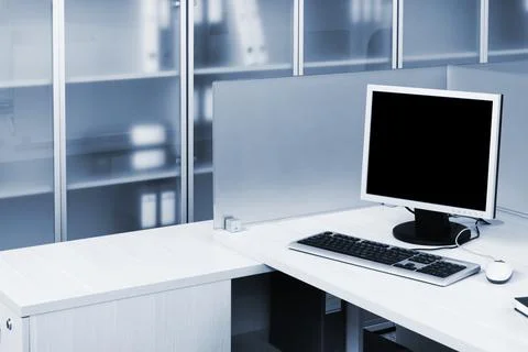 Computer on a desk in modern office Stock Photos
