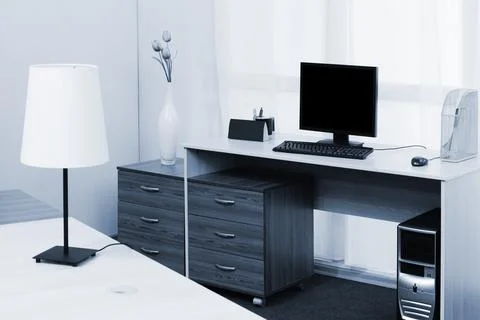 Computer on a desk in a office Stock Photos