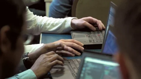 Computer developer working behind laptop Stock Footage 74870757