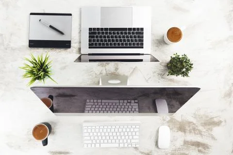 Computer device on work desk loft style top view Stock Photos