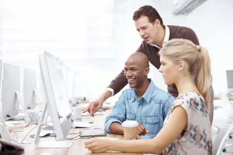 Computer, discussion and web development with business people in creative 스톡 사진