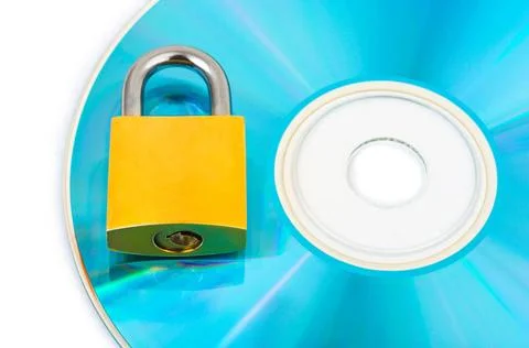 Computer disk and lock Computer disk and lock isolated on white background... Stock Photos