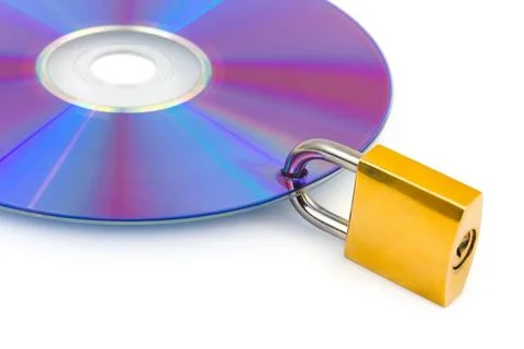 Computer disk and lock Computer disk and lock isolated on white background... Foto stock