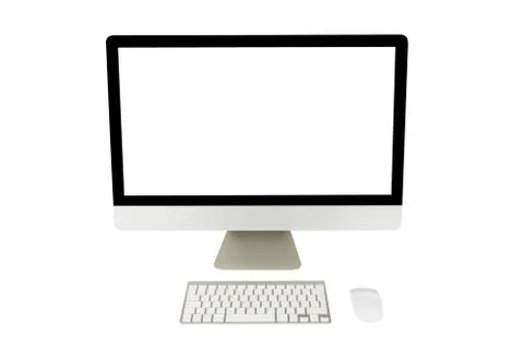 Computer display with blank screen and wireless keyboard Stock Photos