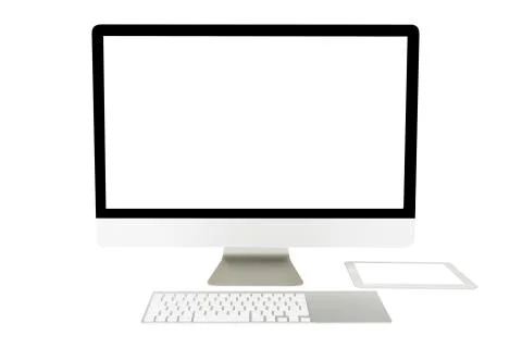 Computer display with blank screen and wireless keyboard Stock Photos
