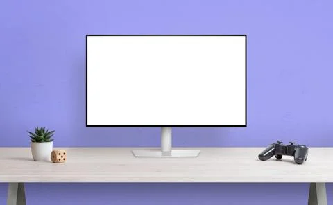 Computer display with isolated screen for mockup on desk. Gamepad, plant and  Stock Photos