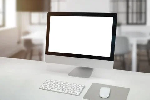 Computer display mockup on office desk. Isolated screen for app or web site p Stock Photos