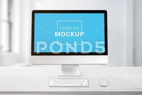 Computer display on office work desk mockup PSD Template