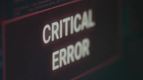 Computer displaying critical error message flashing on screen after cyber crime Stock Footage 231449404