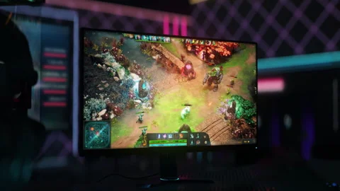 Computer Displays Female Warrior Slaying Troll In Moba Game Tournament Match Stock-Footage 279675535