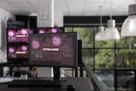 Computer displays showing hacking warning aler Photos