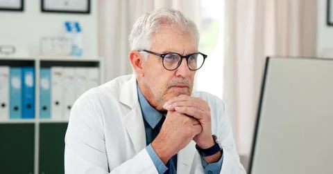 Computer, doctor and reading with man in office of hospital for telehealth .. Stock Photos