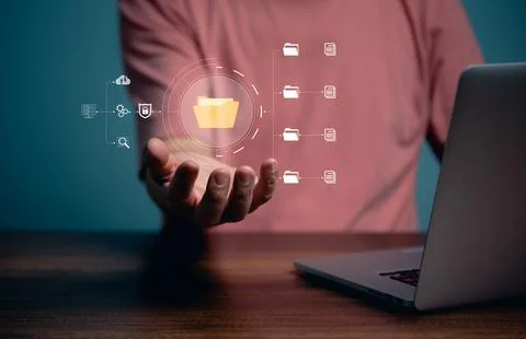 Computer Document management system concept, business man holding folder, fil Stock Photos