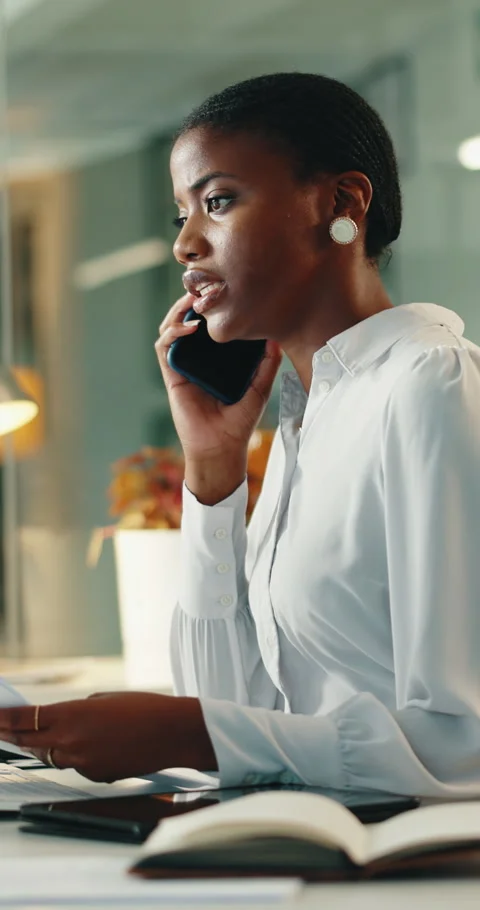 Computer, documents and phone call with business black woman in office for Stock Footage 336774088
