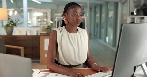Computer, documents and reading with business black woman in office for Stock Footage 322407372