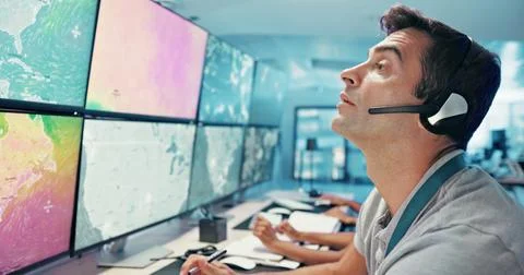 Computer, emergency service and man with headset for global security, dispatcher Stock Photos